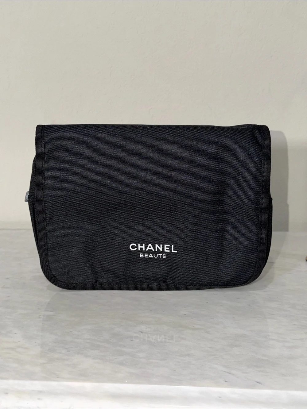 CHANEL Black Toiletry Pouch with White Logo